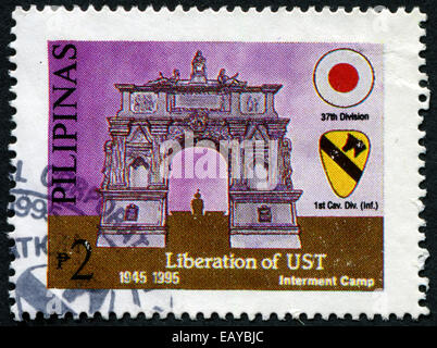 Philippinen - ca. 1995: Eine Briefmarke gedruckt in Philippinen zeigt Befreiung der UST, ca. 1995 Stockfoto