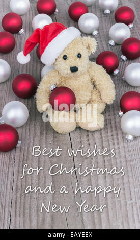 englische Weihnachtskarte mit Teddybär Stockfoto