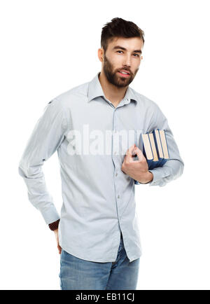 Junge bärtige lächelnden Mann mit Büchern in Händen auf weißem Hintergrund Stockfoto