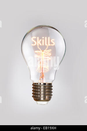 Skills-Konzept in ein Filament-Glühbirne. Stockfoto