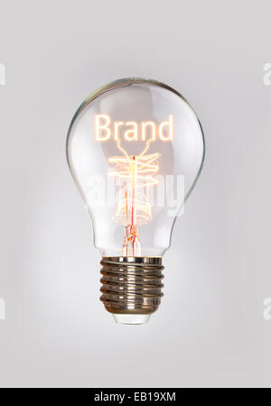 Marken-Konzept in ein Filament-Glühbirne. Stockfoto