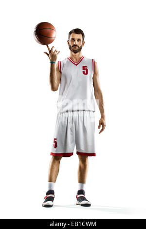 Basketball-Spieler in Aktion isoliert auf weiss Stockfoto