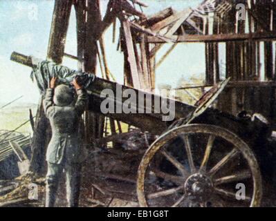 Das zeitgenössische eingefärbte deutsche Propaganda-Foto zeigt einen deutschen Soldat ein Canon-Fass an der Westfront 1917 Kühlung. : Fotoarchiv Neumann - kein Draht-SERVICE Stockfoto