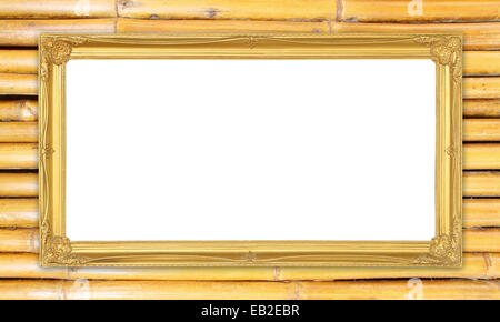 leere Goldrahmen auf Bambus Wand Hintergrund Stockfoto