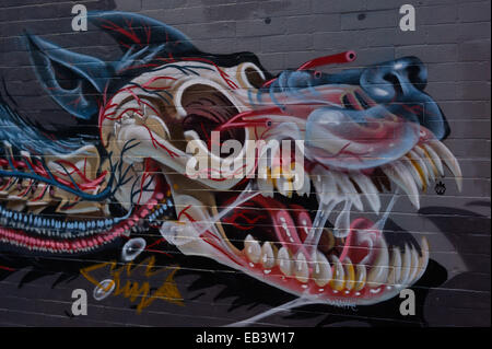 Ein Dinosaurier Graffiti in Haight-Ashbury, San Francisco CA Stockfoto