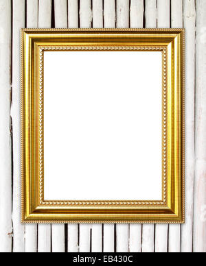 leere Goldrahmen auf Bambus Wand Hintergrund Stockfoto
