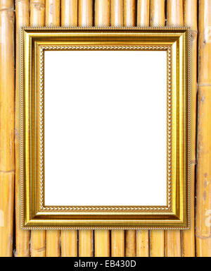 leere Goldrahmen auf Bambus Wand Hintergrund Stockfoto