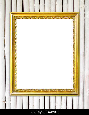 leere Goldrahmen auf Bambus Wand Hintergrund Stockfoto