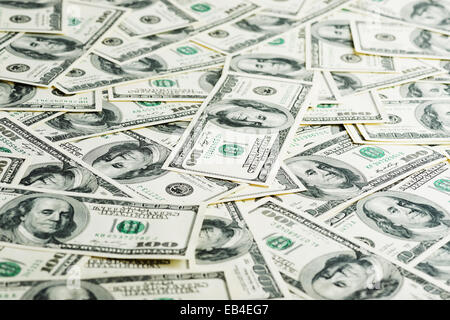 Hundert Dollar anhäufen als Hintergrund. Stockfoto