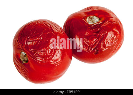 Faule Tomaten auf dem weißen Hintergrund Stockfoto