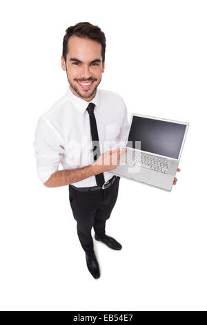Lächelnde Geschäftsmann auf seinem laptop Stockfoto