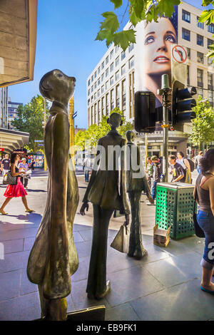 Drei Unternehmer, die ihr eigenes Mittagessen von Alison Weaver und Paul Quinn gebracht. Bronzeskulptur, 1993 Stockfoto