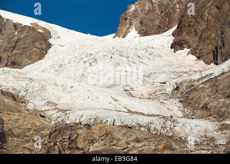 Die rasch sich zurückziehenden Gletscher des Glacier De La Lex Blanche und Glacier du Petit Montblanc auf die Aiguille De Tre La tête in Stockfoto