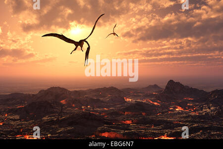 Ein paar der Quetzalcoatlus fliegen über eine Vulkanlandschaft. Stockfoto