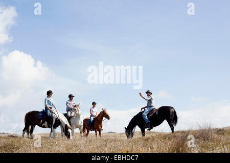 Pferd Reiten, Pakiri Beach, Auckland, Neuseeland Stockfoto