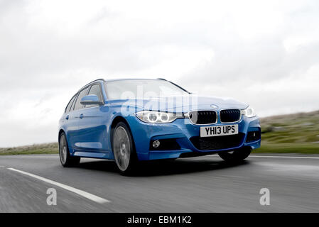 2013 BMW 330d X Drive 4 x 4 schnelle Kombi fahren Stockfoto