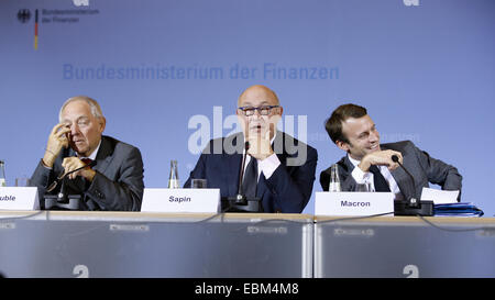 Berlin, Deutschland. 2. Dezember 2014. Begleiten Sie Pressekonferenz anlässlich der 47. Deutsch-französischer Finanz- und Wirtschaftsrat mit Bundesfinanzminister Wolfgang SchŠuble und Wirtschaftsminister Sigmar Gabriel und ihren französischen Kollegen Michel Sapin und Emmanuel Macron sowie Bundesbankpräsident Jens Weidmann und Anne Le Lorier, erster stellvertretender Gouverneur der Banque de France, auf 2December, 2014, in Berlin, Deutschland. Bildnachweis: Reynaldo Chaib Paganelli/Alamy Live-Nachrichten Stockfoto