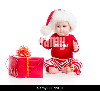 Babykleidung weared Santa mit Geschenk-box Stockfoto