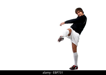 Fußball-Spieler einen Ball, Deutschland Stockfoto