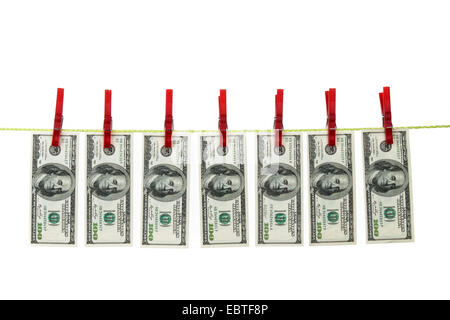 100-Dollar-Scheine auf der Wäscheleine symbolisiert "Geldwäsche", USA Stockfoto