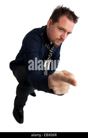 junger Geschäftsmann zeigen Stockfoto