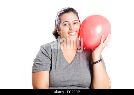 Fettleibige Inderin mit Ballon Stockfoto