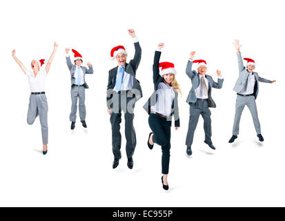 Gruppe von fröhlichen Geschäftsleute Santa Hüte tragen Stockfoto