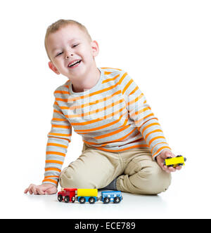 Kid Boy mit Zug Spielzeug spielen Stockfoto