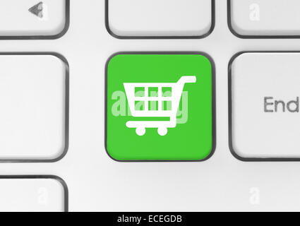 Einkaufswagen-Symbol auf die grüne Taste Stockfoto