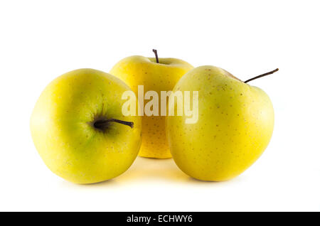 Goldene Äpfel isoliert auf weiss Stockfoto