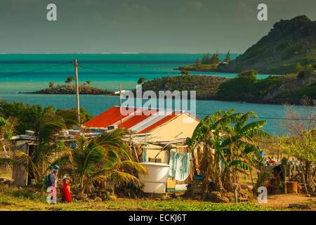 Mauritius, Rodrigues Insel, Pointe Mapou, Schülerinnen und Schüler nach Hause auf Kreolisch am Meer Stockfoto