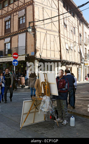 TORO (ZAMORA), Spanien - 13. Oktober 2012: Ein unbekannter Kandidat in Plein Aire Malwettbewerb arbeitet an einem Gemälde an der th Stockfoto