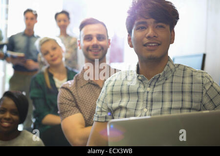 Schüler hören während seminar Stockfoto