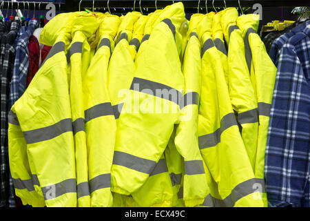 Leuchtend gelbe hohe Visibilty Jacken Stockfoto
