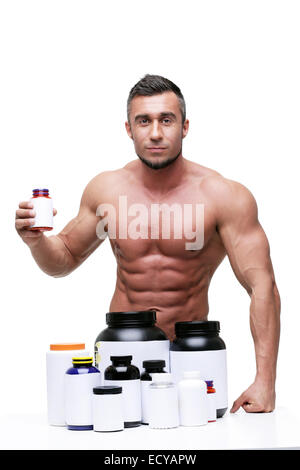 Porträt eines schweren muskulösen Mannes mit Sports nutrtion Stockfoto