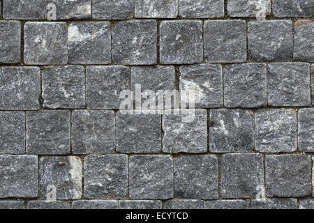 Kopfsteinpflaster Granit Würfel gemacht. Hintergrundtextur. Stockfoto