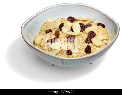 hausgemachte Schüssel voll Haferflocken-Rosinen-Mandel-Müsli Stockfoto