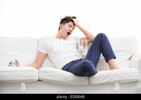 Junger Mann nur aufwachen Stockfoto
