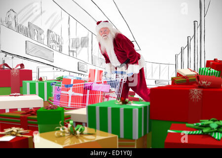Zusammengesetztes Bild von Santa, die Geschenke aus dem Warenkorb zu liefern Stockfoto