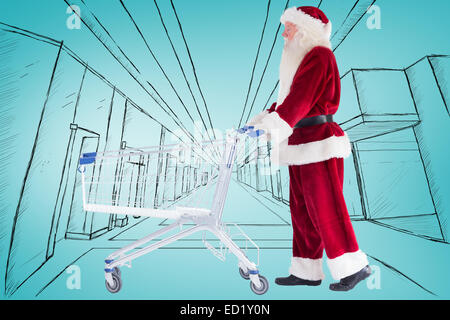 Zusammengesetztes Bild von Santa schiebt einen Einkaufswagen Stockfoto