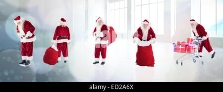 Zusammengesetztes Bild der verschiedenen Weihnachtsmänner Stockfoto