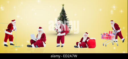 Zusammengesetztes Bild der verschiedenen Weihnachtsmänner Stockfoto