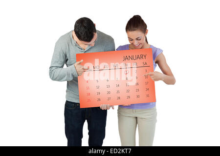 Zusammengesetztes Bild des jungen Paares auf Banner zeigen sie halten Stockfoto