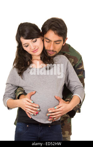 glücklich stolz Militär Soldat umarmt schwangere Frau Stockfoto
