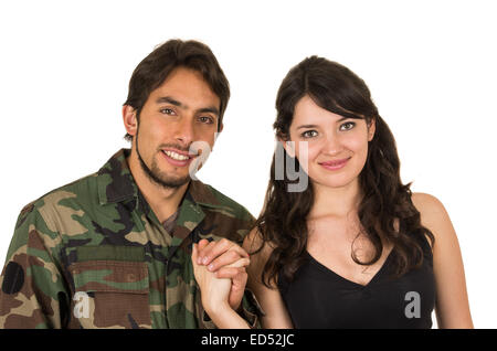 junger Militär Soldat kehrt zurück, um seine Frau Freundin treffen Stockfoto