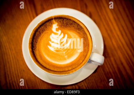 Tasse Kaffee mit Latte Art. Stockfoto