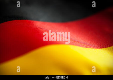 Makro-Ansicht der deutschen Flagge mit geringen Schärfentiefe zu abstrahieren. Stockfoto