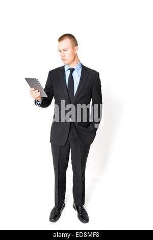 Junge Mann tragen Anzug mit elektronischen Gerät, nicht in Militäruniform siehe Bild EDMF6, EDMF4, oder EDMF3 für andere Kleidung Stockfoto