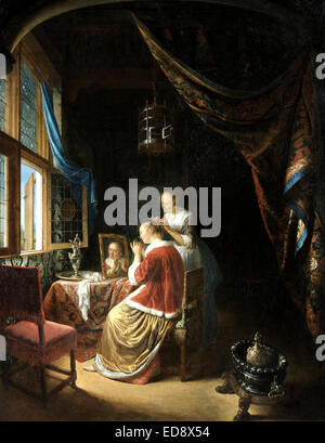 Gerrit Dou, eine junge Frau auf ihre Toilette. 1667 Öl auf Holz. Museum Boijmans Van Beuningen, Rotterdam, Niederlande. Stockfoto