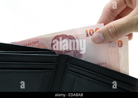 Konzept der Abholung Geld aus der Brieftasche Stockfoto